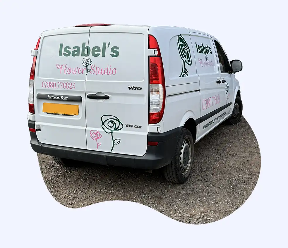 Branded van wrap for Isabel’s Flower Studio — showcasing custom vehicle graphics and professional printing for small businesses.