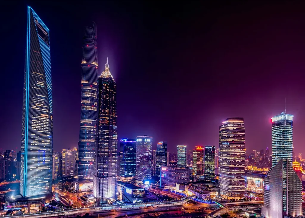 Modern city skyline at night representing ambition, growth, and long-term business vision