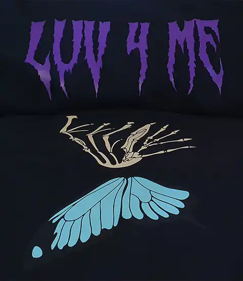 Custom vinyl clothing printed graphic with “LUV 4 ME” text and skeleton hand holding a blue butterfly wing on black fabric.